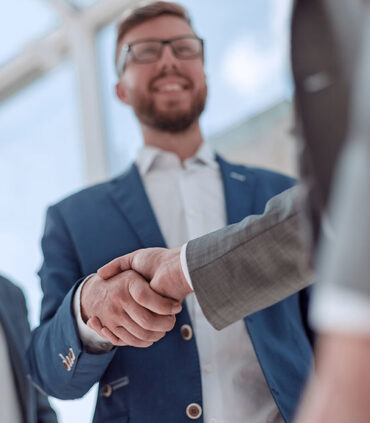 close up. handshake business partners on a blurred background. photo with copy space